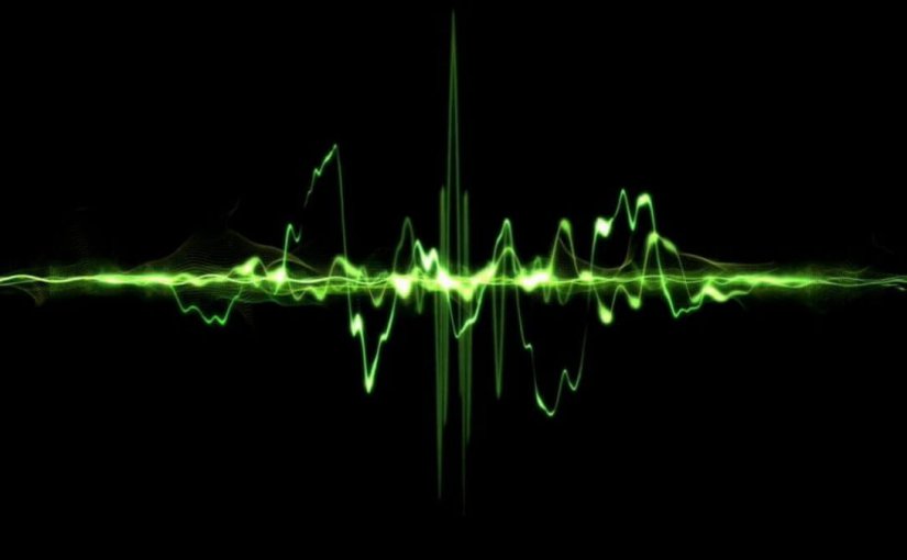 Green waveform representing harmonic analysis in marine electrical systems, illustrating the importance of monitoring harmonics for electrical safety and efficiency.