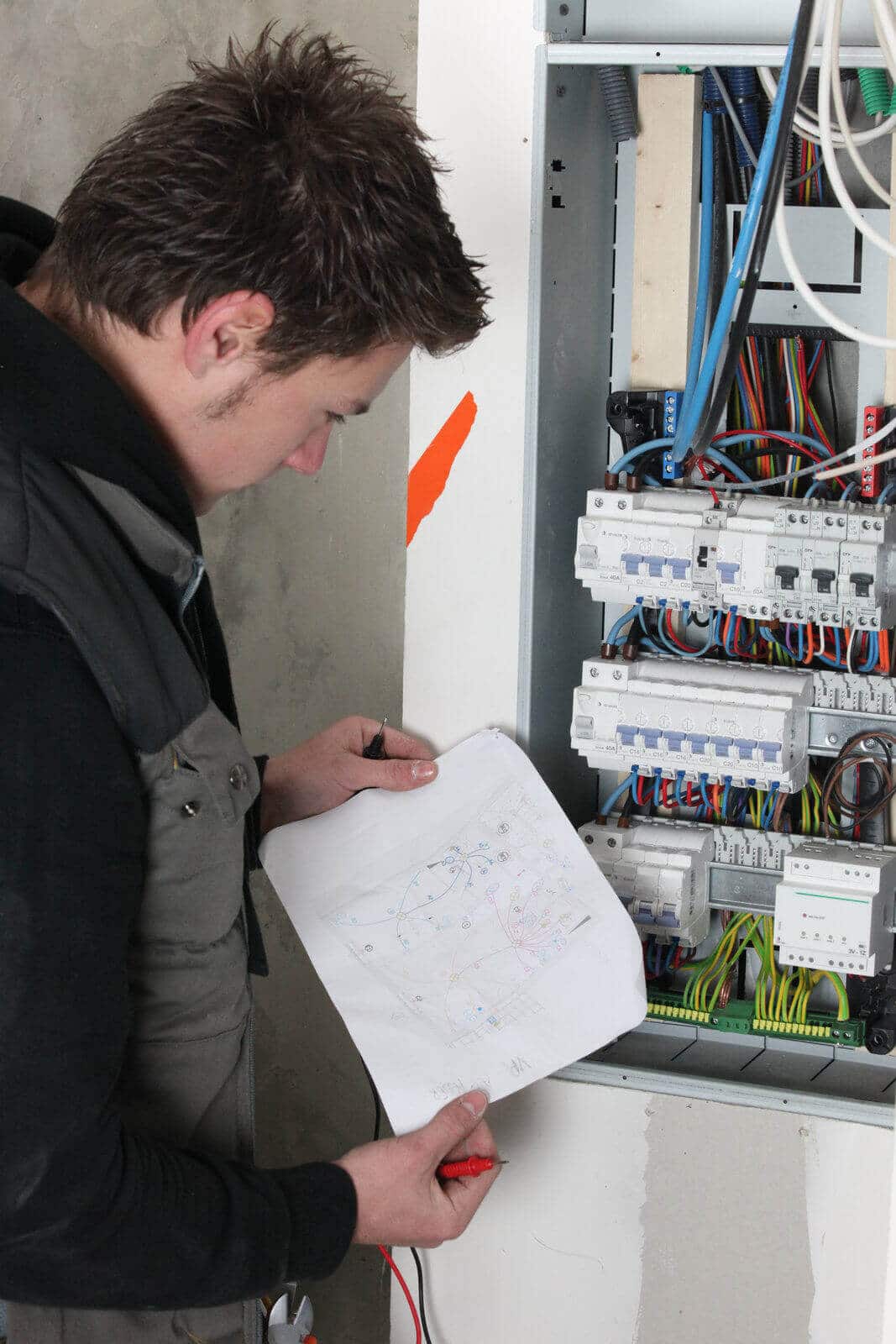 5658172 Electrician With Sketch Of Electrical Panel