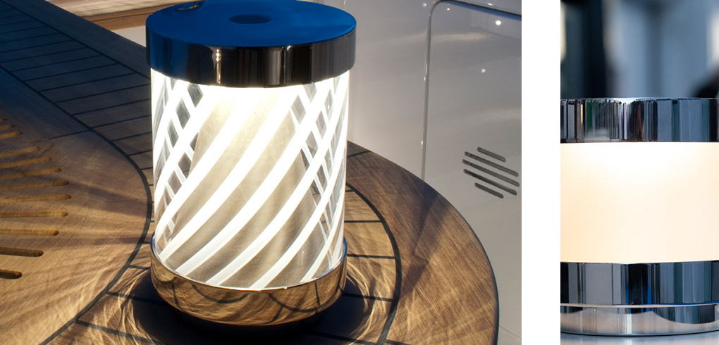 img cantalupi 04 LED marine light fixture with decorative design, showcasing energy-efficient lighting for yacht installations on wooden surface.