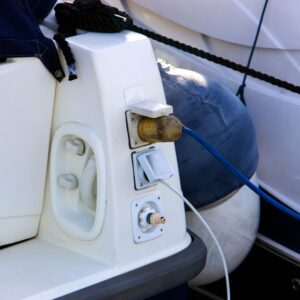 Marine electrical system interface with connectors and cables for yacht maintenance and safety.