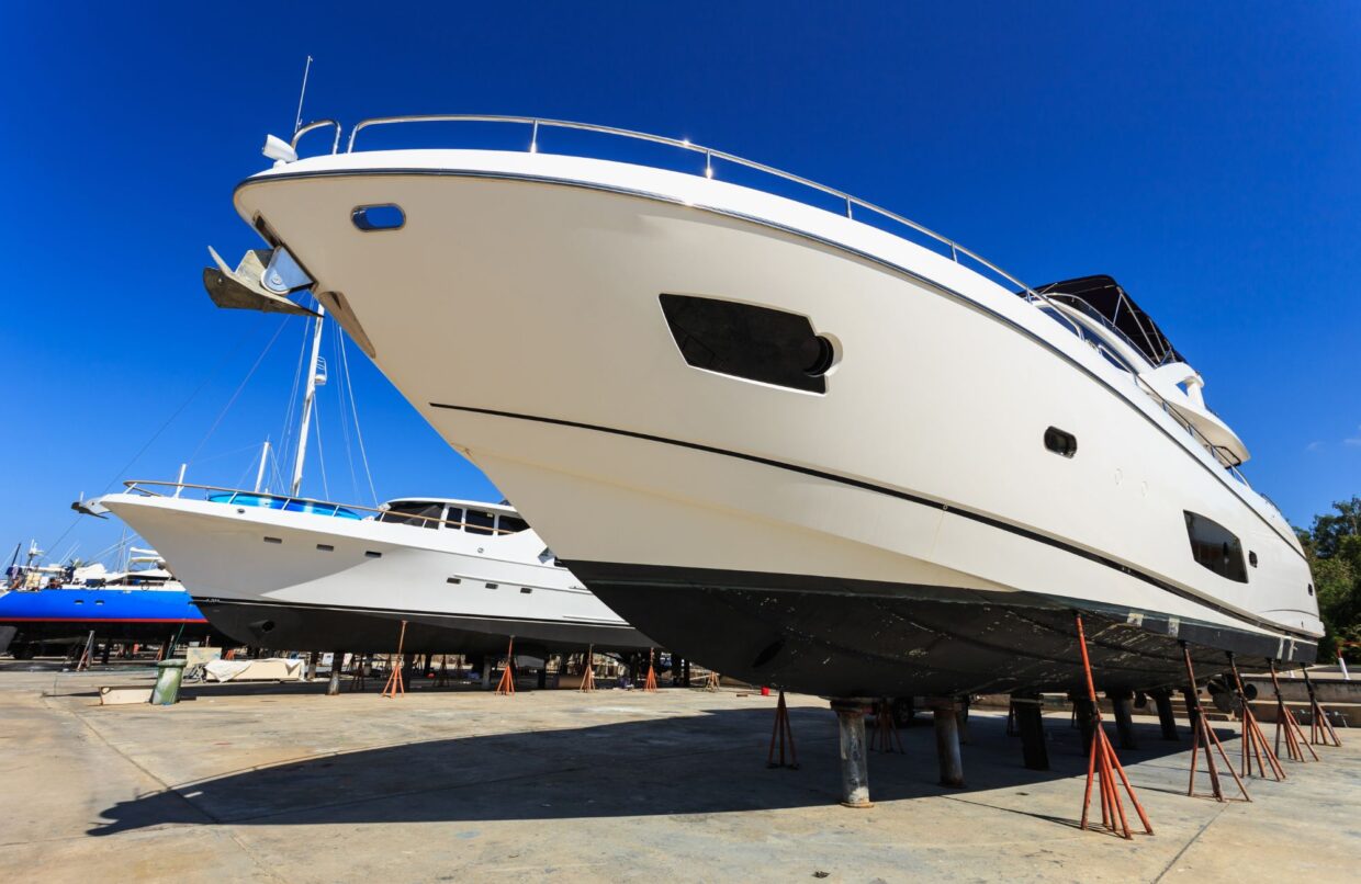 Yachts on dry dock at Safe Harbor Savannah, showcasing custom-designed electrical systems and maintenance services by TESS LLC.