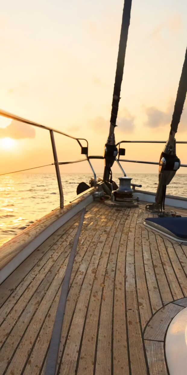 Yacht deck at sunset showcasing marine electrical systems and TESS Electrical LLC's service environment in Dade County.