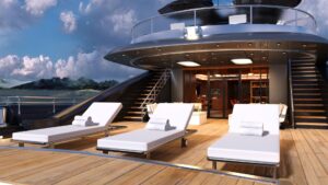 Luxury yacht deck with lounge chairs, scenic ocean view, and modern design, emphasizing relaxation and marine leisure.