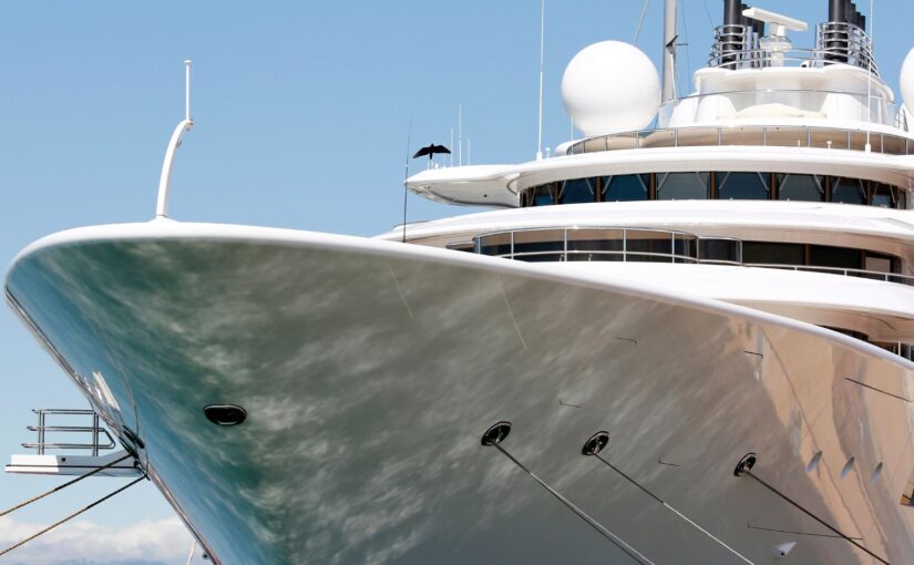 Luxury yacht bow with sleek design and advanced marine technology, emphasizing yacht security and electrical systems.