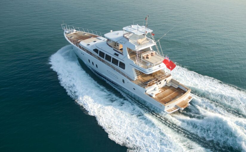 Luxury yacht cruising on calm waters, showcasing advanced design and features relevant to yacht security and protection for owners in Southern Florida.