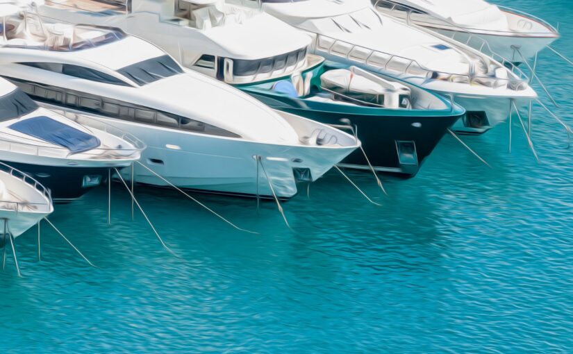 Luxury yachts docked in turquoise waters, showcasing TESS Electrical LLC's yacht electrical installation services in Fort Lauderdale.