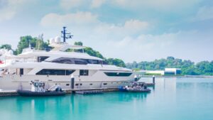 Luxury yacht docked at marina in Savannah, Georgia, showcasing marine electrical solutions and safety for yacht owners.