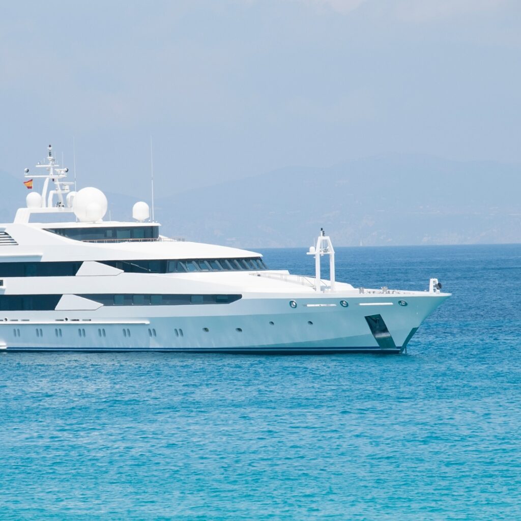 Luxury yacht on calm waters, showcasing maritime technology and efficiency, relevant to Magnus Shore Converters enhancing safety in marine operations.