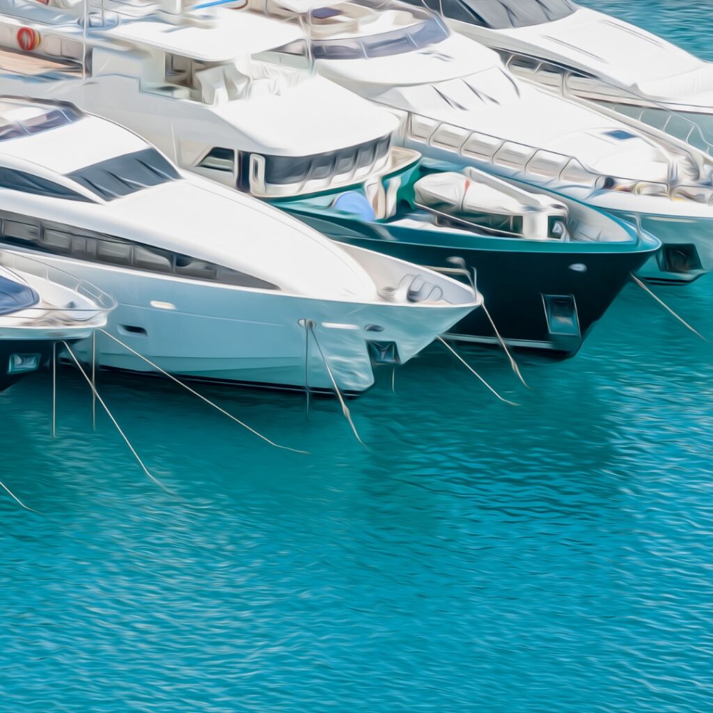 Yachts docked in Savannah harbor, showcasing luxury vessels and highlighting the benefits of Magnus Shore Power Converters for reliable onboard power supply.