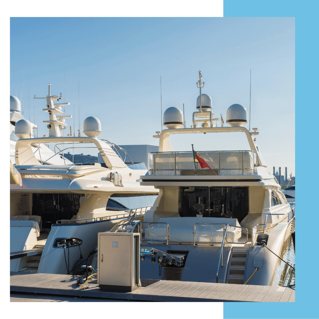Yachts docked in Barcelona marina showcasing luxury vessels, highlighting TESS's marine electrical services for yachts and commercial vessels.
