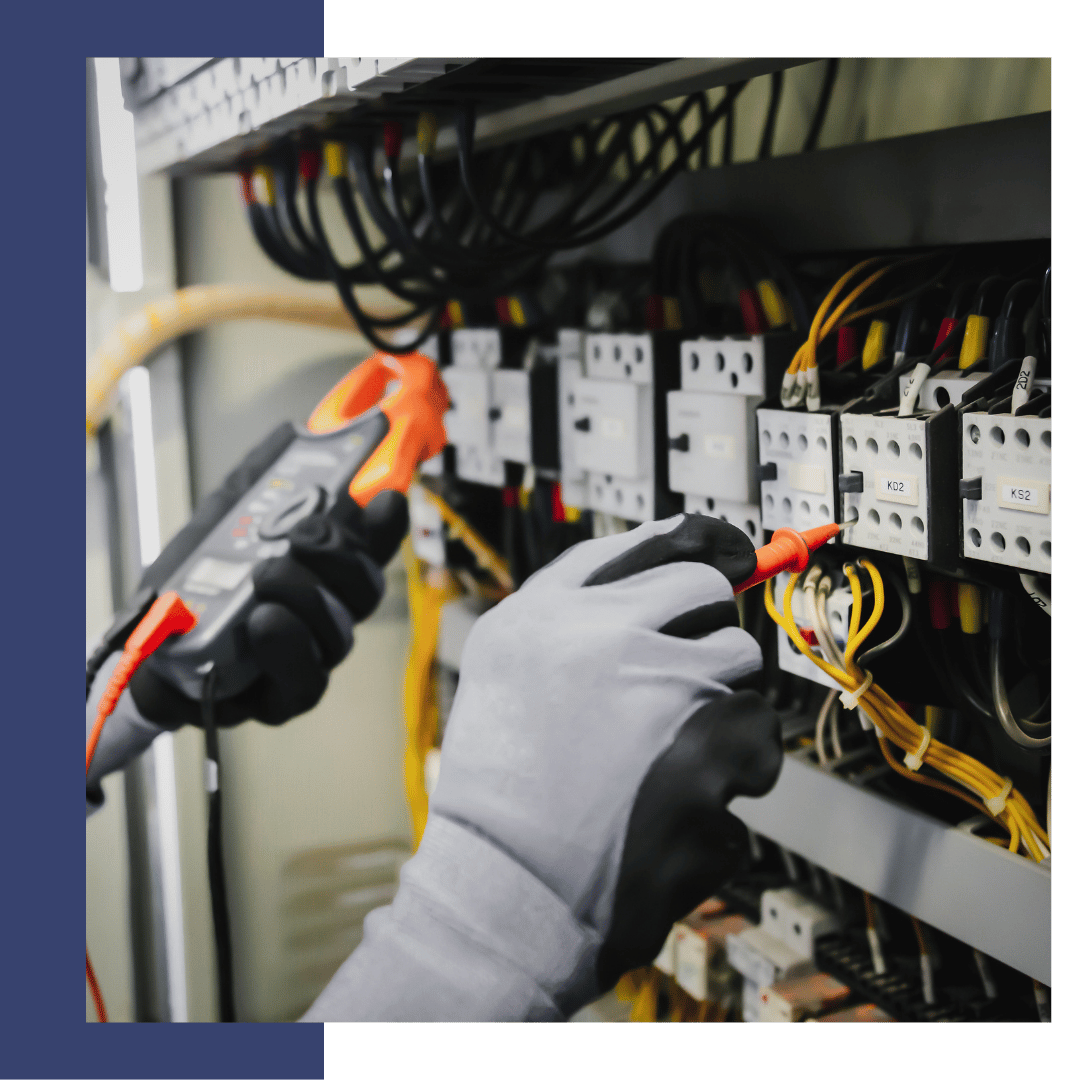 Technician using multimeter on electrical panel, showcasing marine electrical service expertise in Barcelona for yachts and vessels.